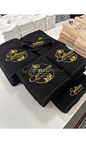 Siyah logolu spa wellness havlu seti altın nakışlı kurumsal üretim